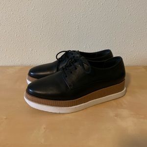 Platform oxfords with a layered sole.